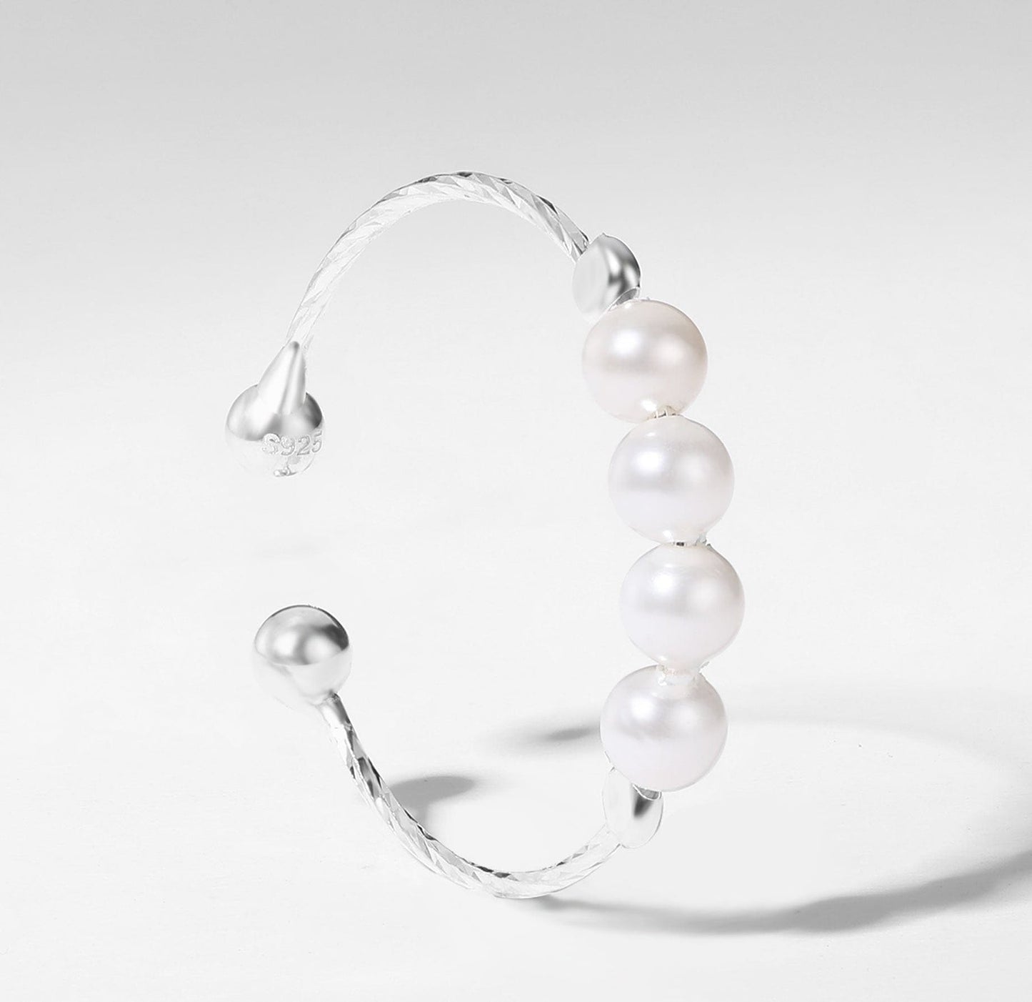 Pearl rotating ring